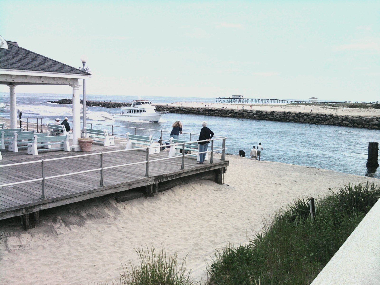 Boats entering Shark River Inlet