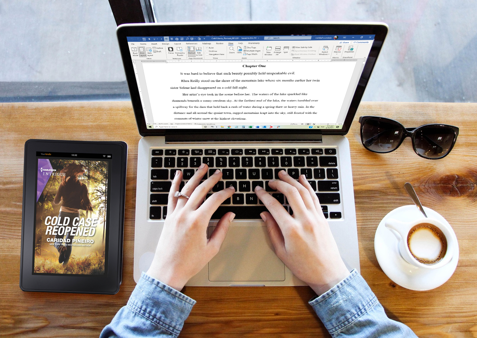 Caridad at work writing romance novels