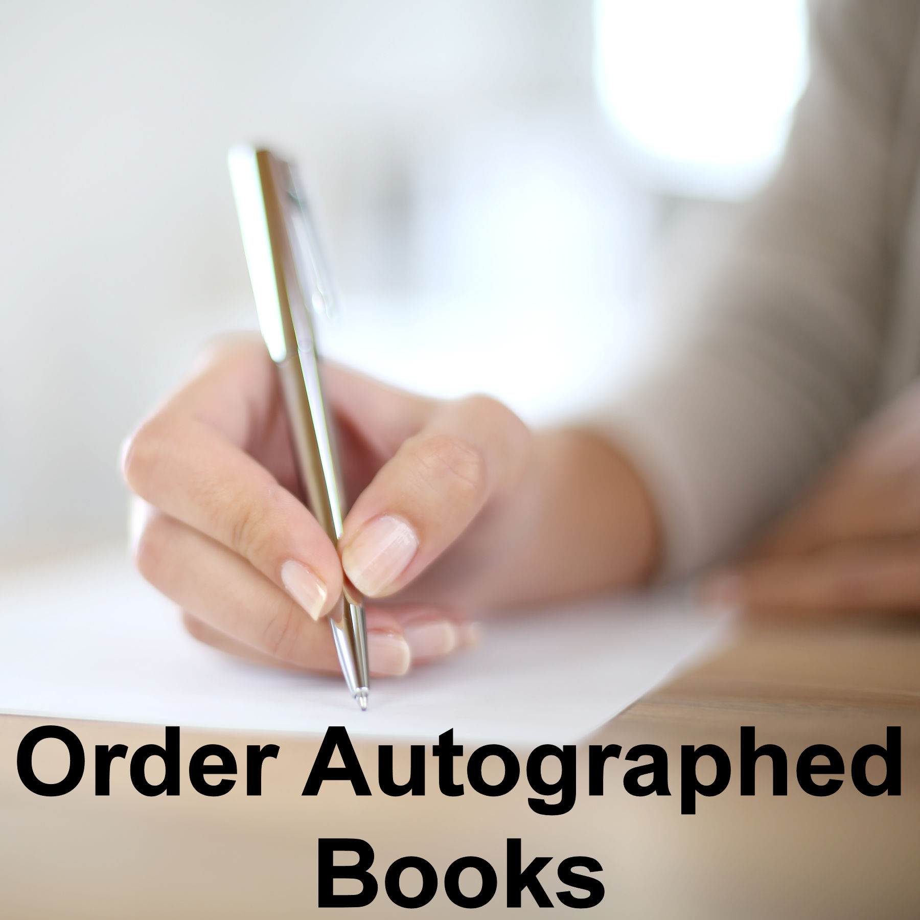 Caridad autographed books